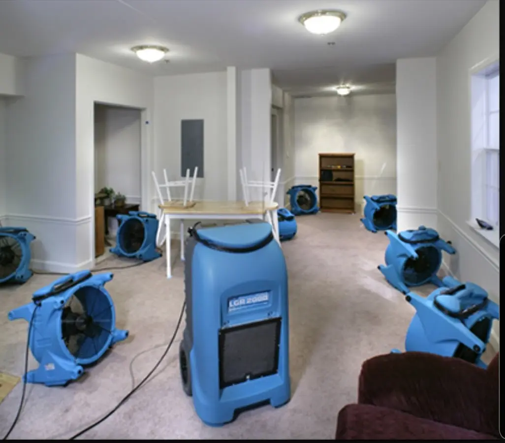 Air movers and dehumidifier setup for Water Damage Restoration in Baldwinsville